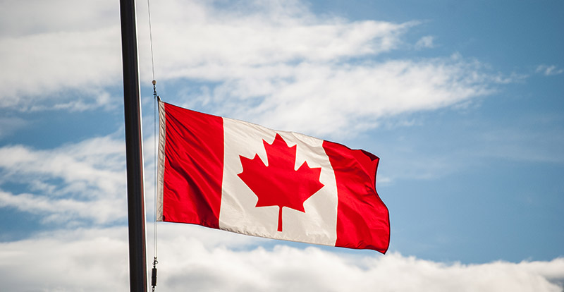 Canadian Flag Waving at Half-Mast